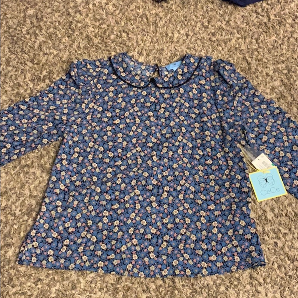 Brand new CECE top from dilliards